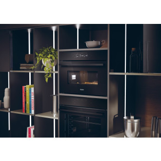 Kompaktní mikrovlnná trouba s grilem a víceúrovňovým pečením (kruhové topné těleso) Haier černá 38900761